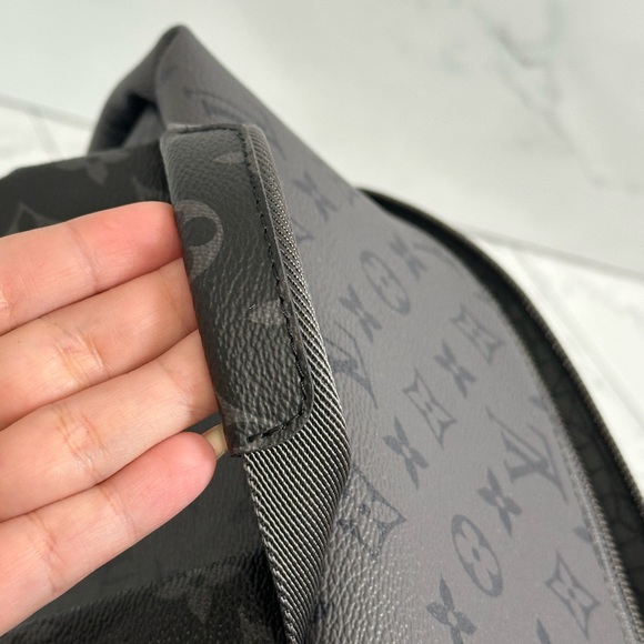 LOUIS VUITTON
LV X YK Monogram Eclipse Reverse Kusama Pumpkin Discovery Backpack - Picture 5 of 9